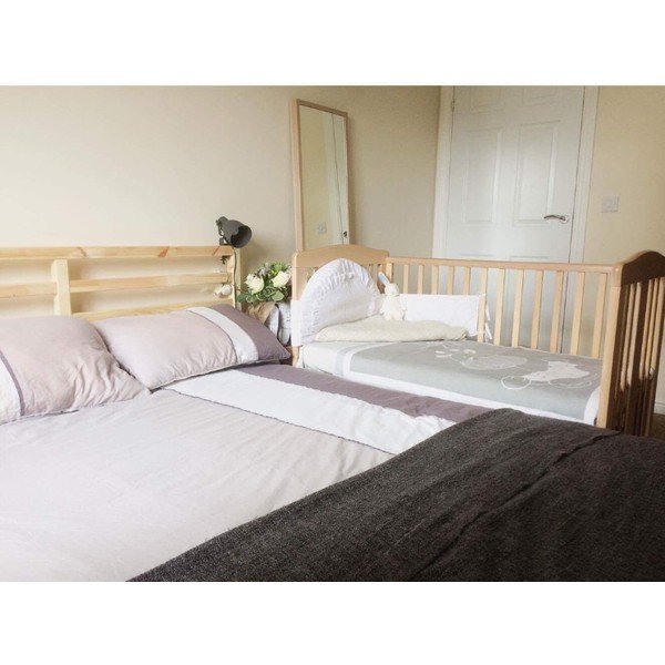 Pătuț din lemn cu roți și grilaj ajustabil YappyKids Qu, 60 x 120 cm, natural-image-1