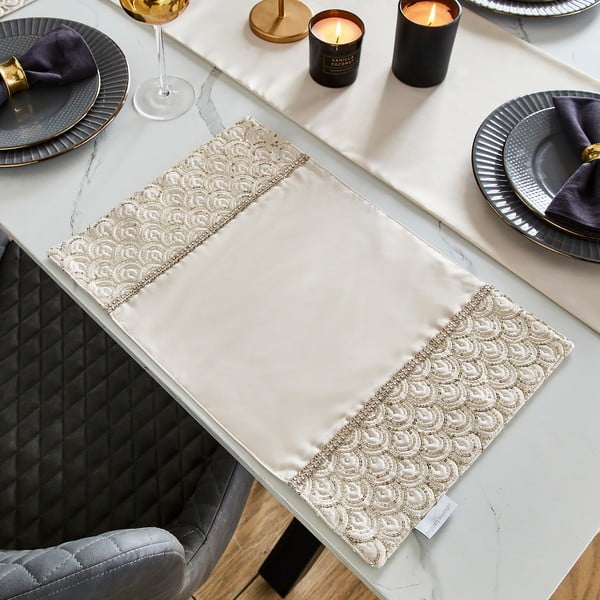 Suporturi pentru farfurii 4 buc. din material textil 30x46 cm Deco Sequin – Catherine Lansfield