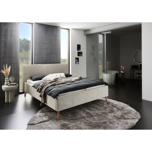 Pat matrimonial crem tapițat cu spațiu de depozitare cu somieră 160x200 cm Riva – Meise Möbel-image-1