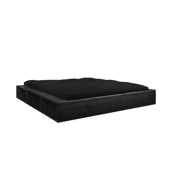 Pat din lemn masiv cu spațiu de depozitare și futon negru Comfort Karup Design, 140 x 200 cm, negru
